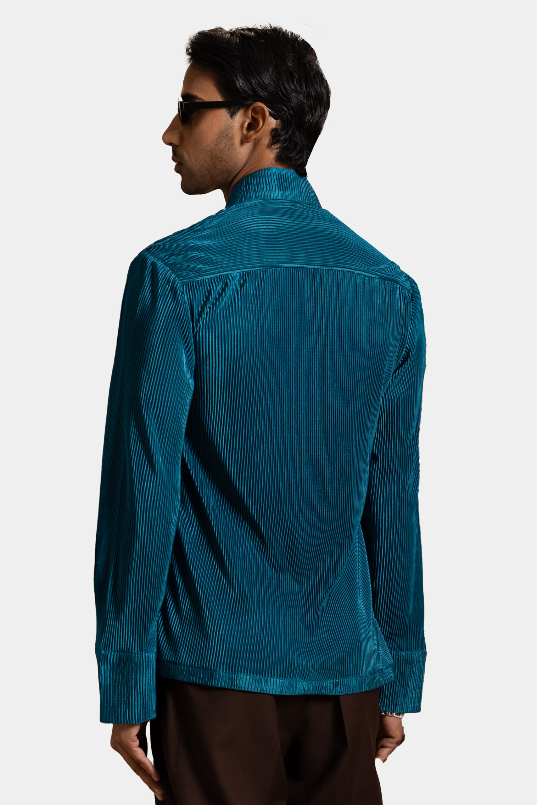 Teal pleated shirt with modern design — Shubham Shinde Menswear luxury men's shirt for contemporary style.