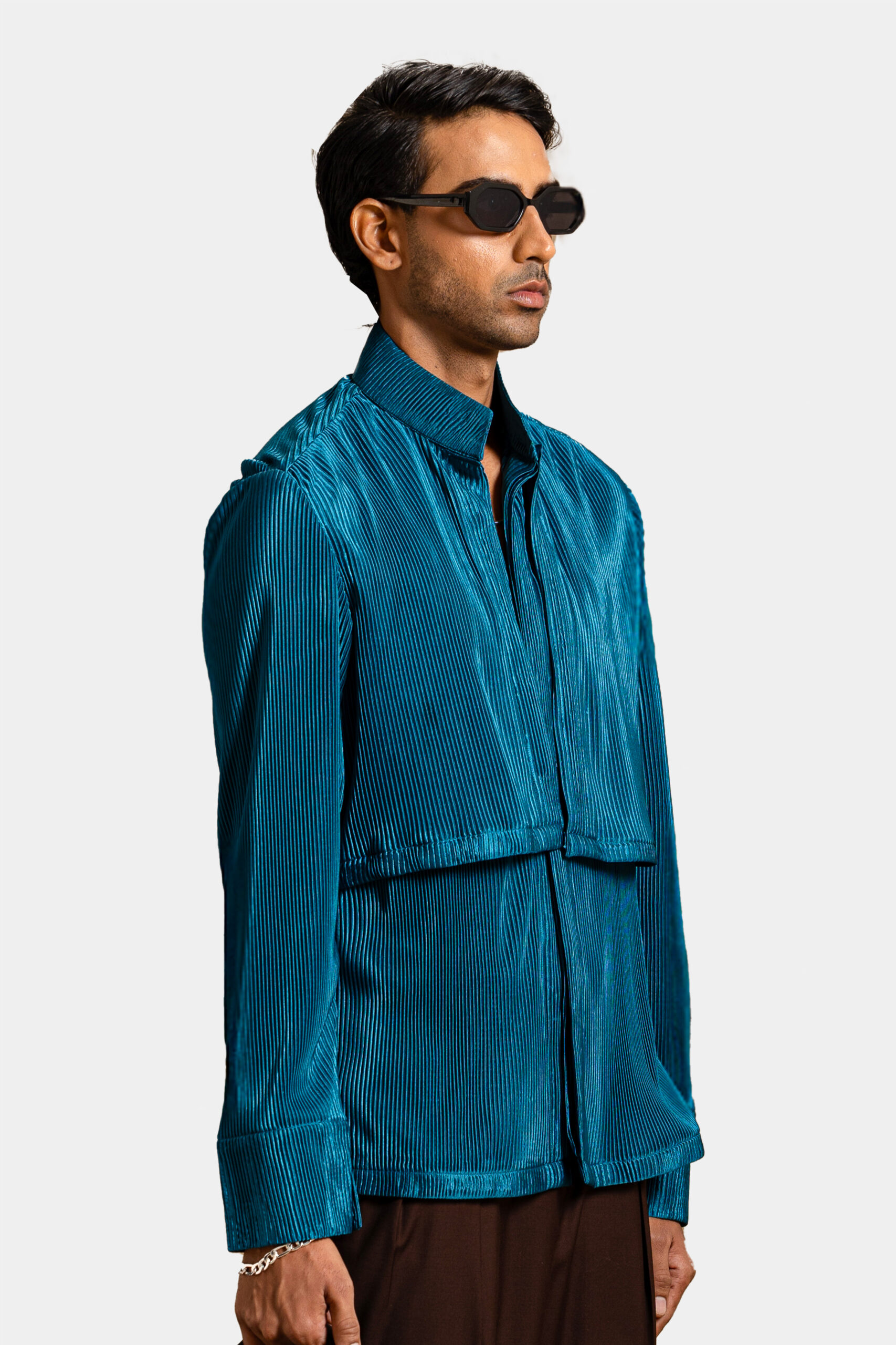 Teal pleated shirt with modern design — Shubham Shinde Menswear luxury men's shirt for contemporary style.
