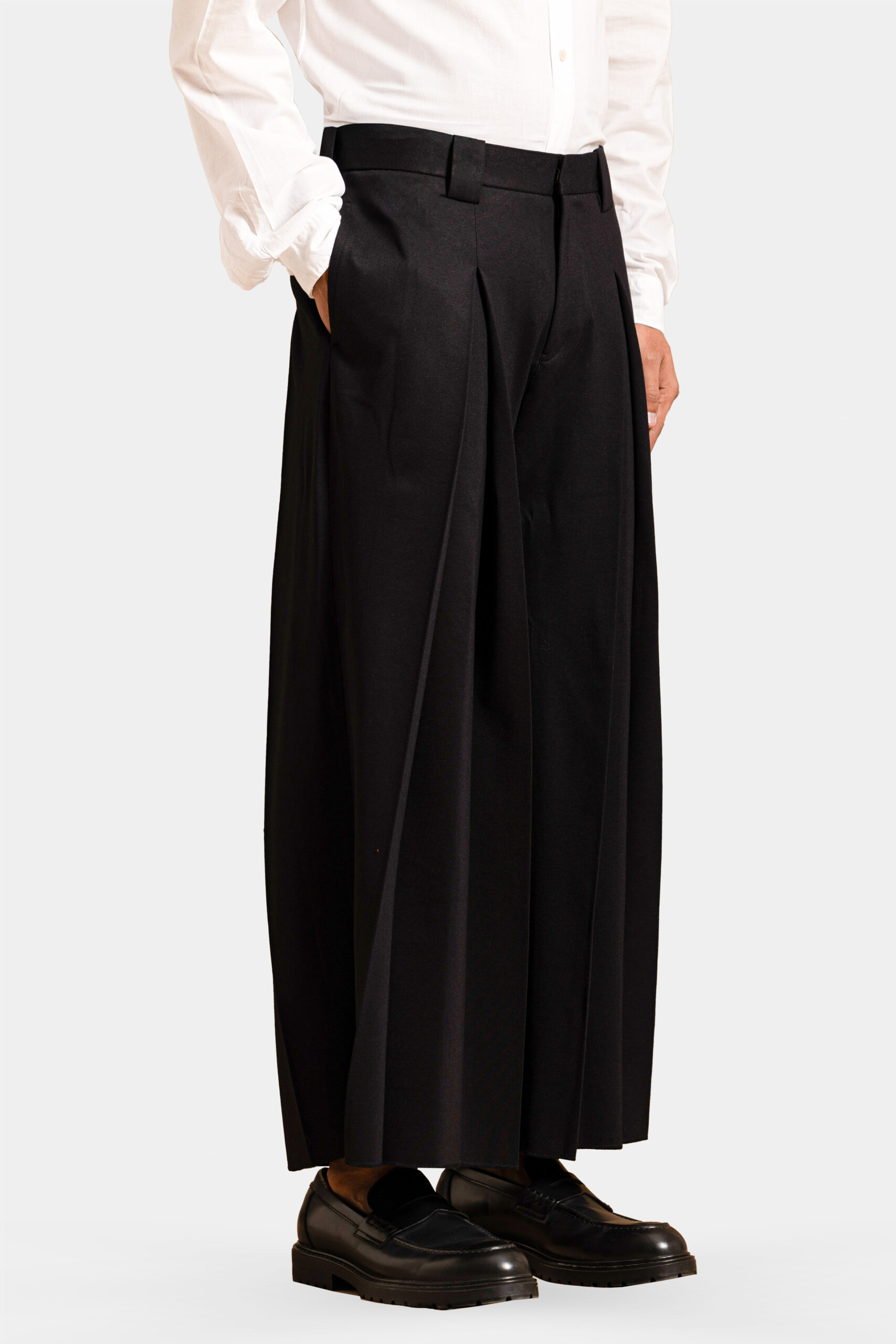 Boheme four-way stretch trousers with modern front and back pleats — Shubham Shinde Menswear luxury modern trousers.