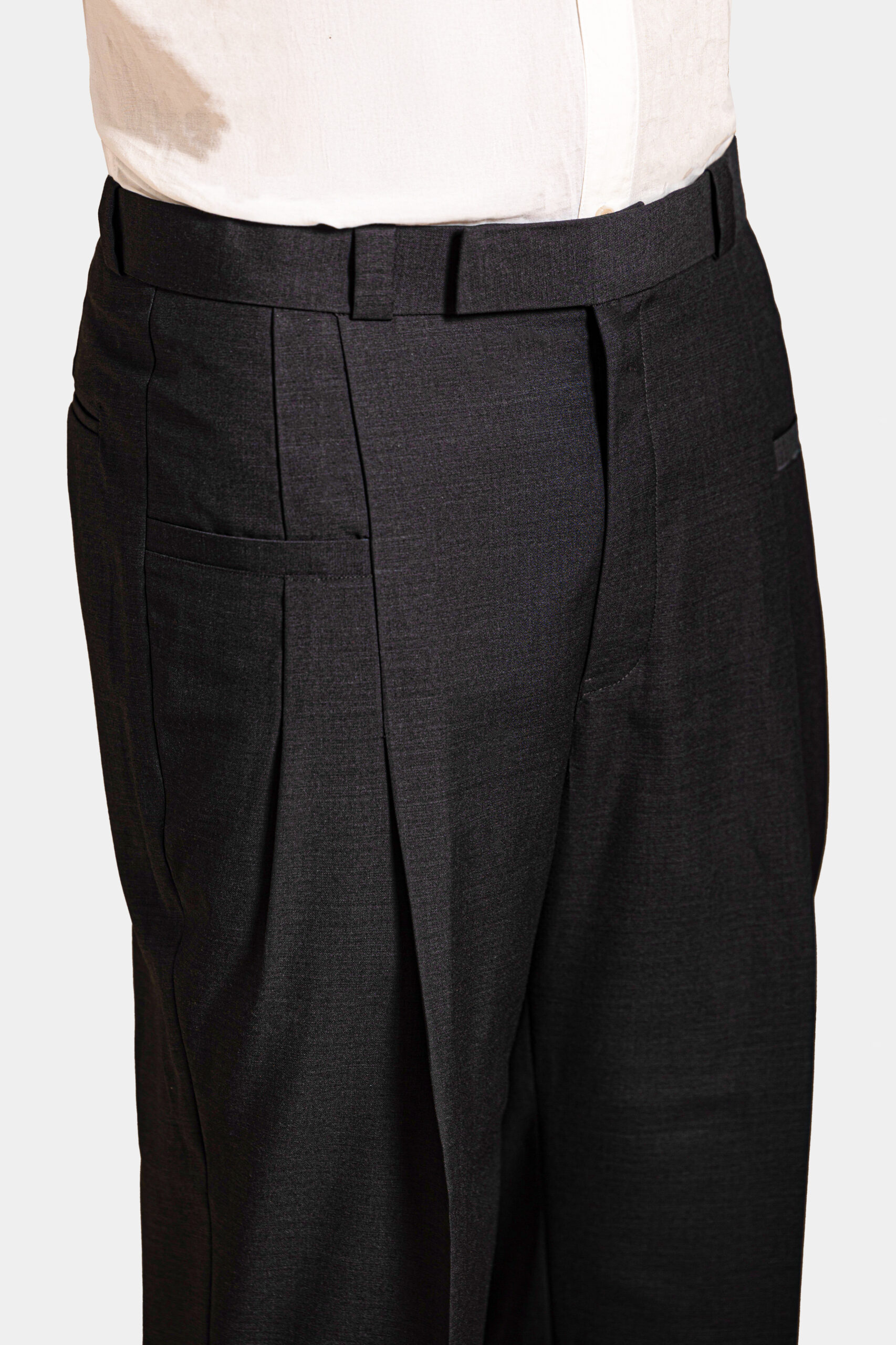 Dark grey Super 160s Merino wool trousers with welt pocket — Shubham Shinde Menswear luxury formal wear.