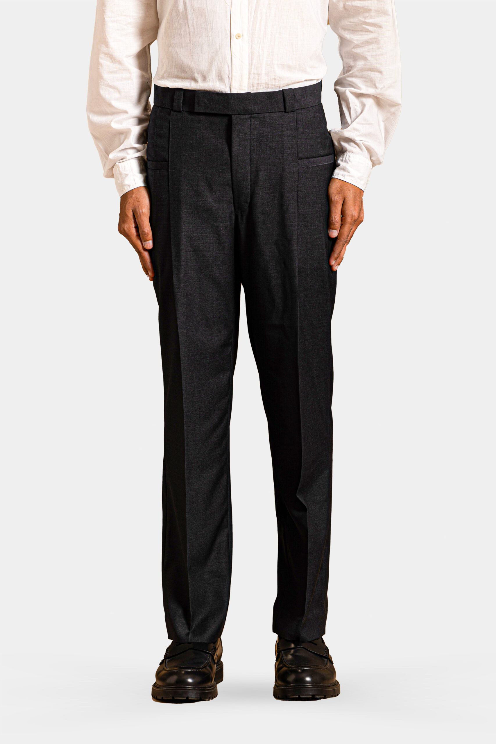 Dark grey Super 160s Merino wool trousers with welt pocket — Shubham Shinde Menswear luxury formal wear.