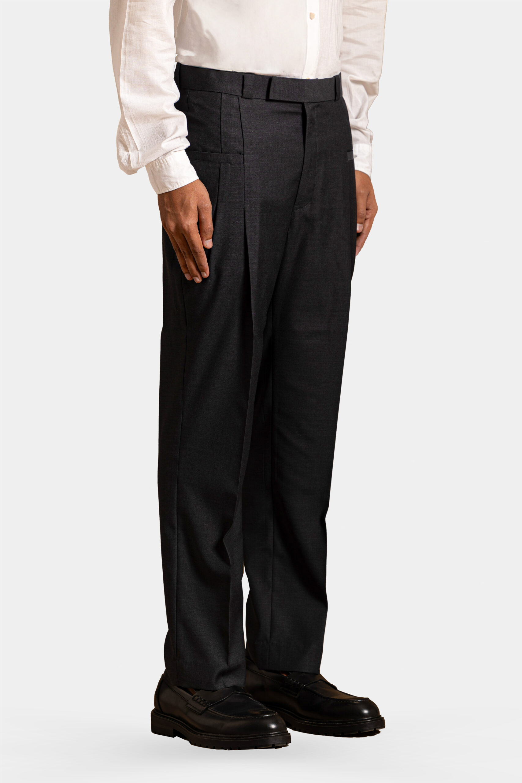 Dark grey Super 160s Merino wool trousers with welt pocket — Shubham Shinde Menswear luxury formal wear.