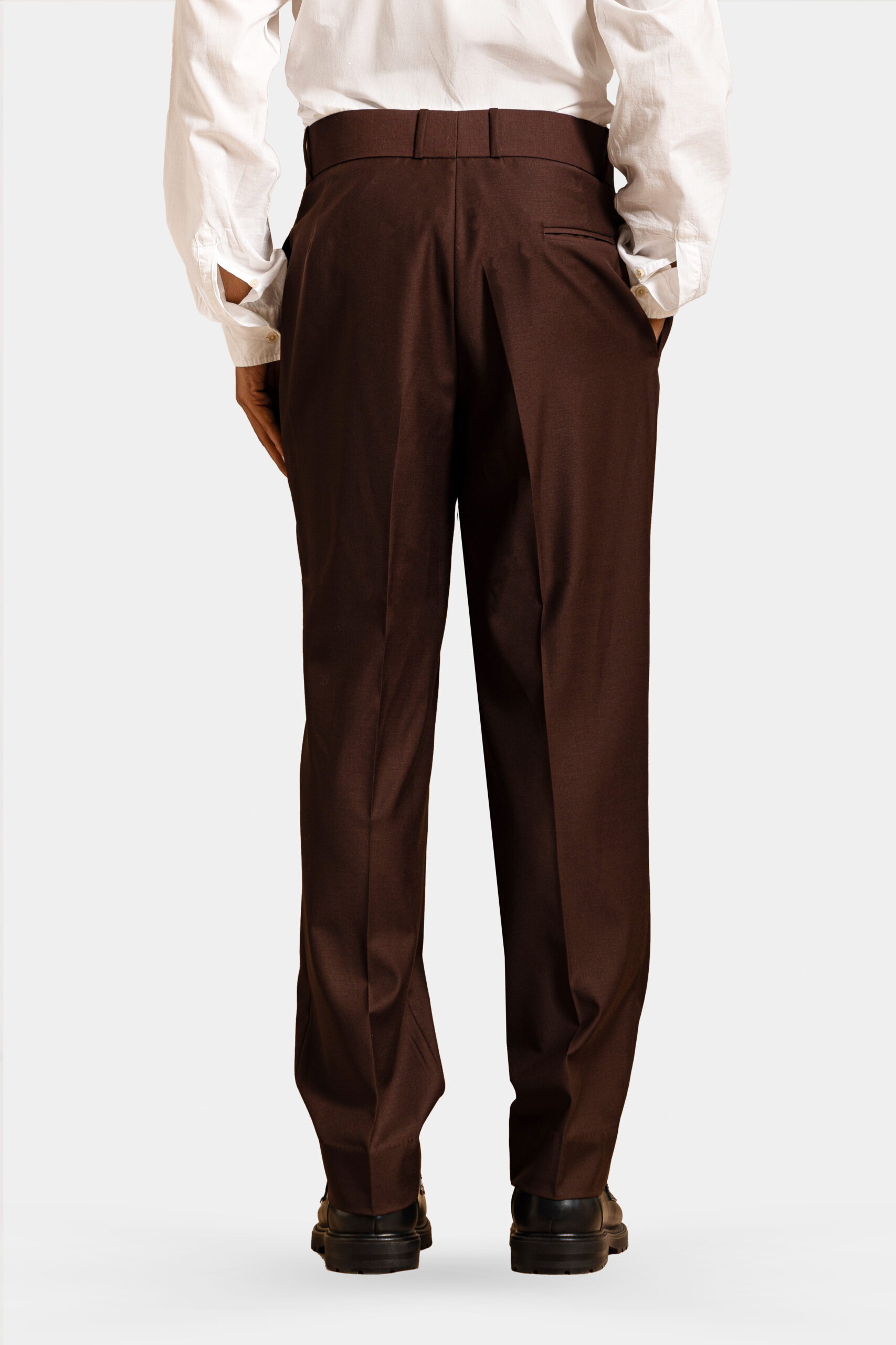 Sartorial brown Super 160s Merino wool trousers with double pleats — Shubham Shinde Menswear luxury formal wool trousers for men.