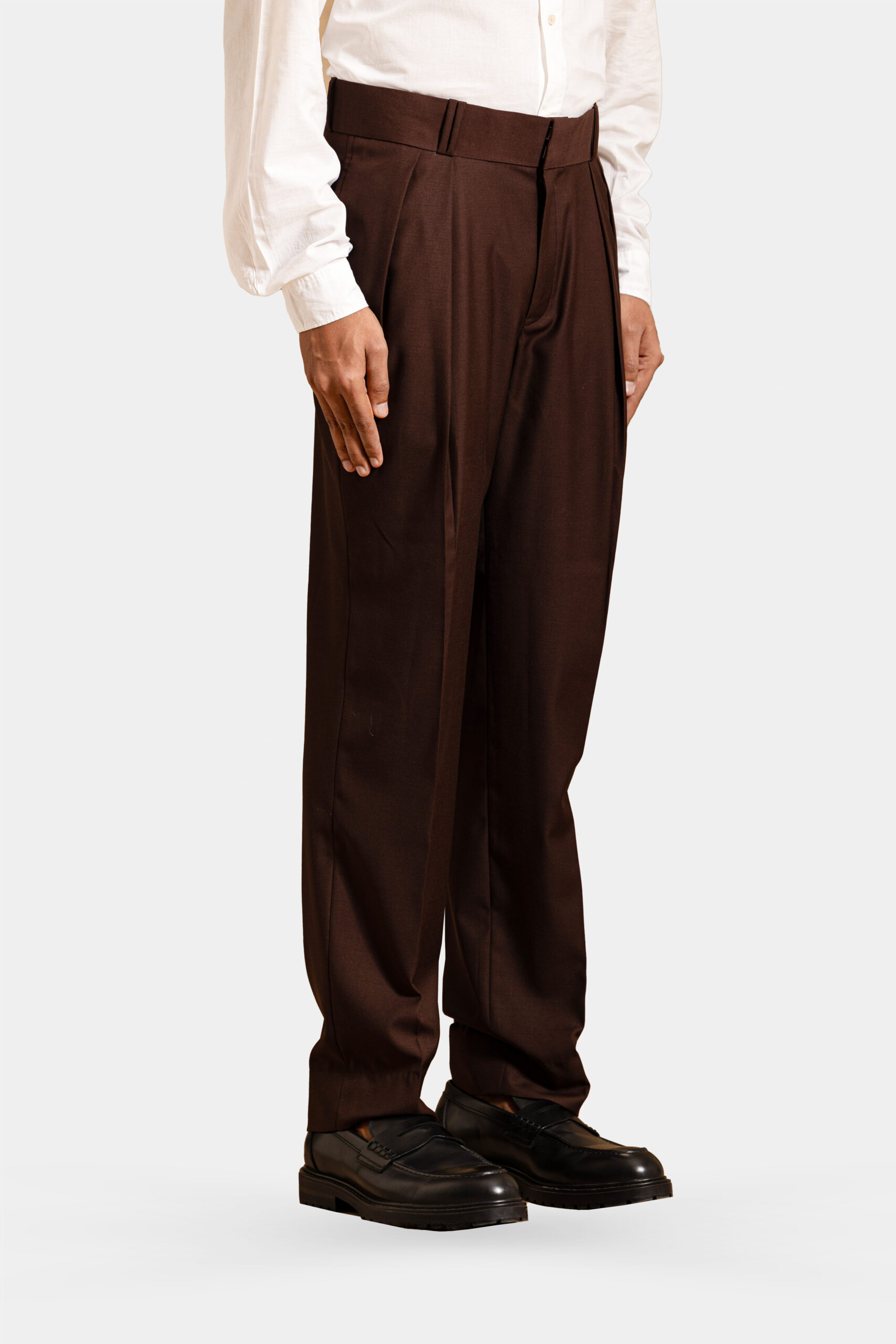 Sartorial brown Super 160s Merino wool trousers with double pleats — Shubham Shinde Menswear luxury formal wool trousers for men.