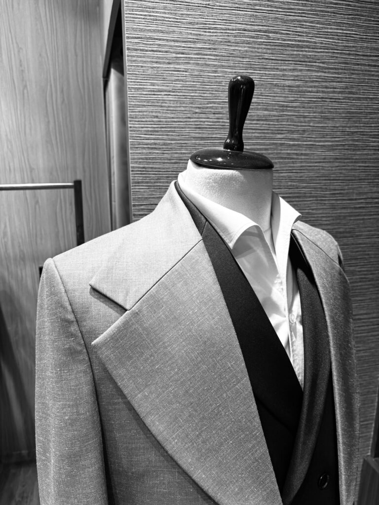 Stylish suits in summer by Shubham Shinde featuring a tailored blazer with wide peak lapels and waistcoat.